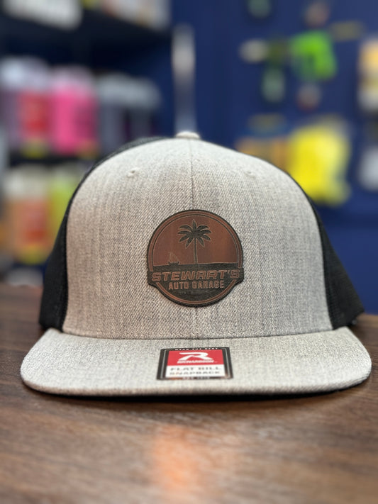 Stewart's Auto Garage Bronze metallic Heather Gray and Black trucker